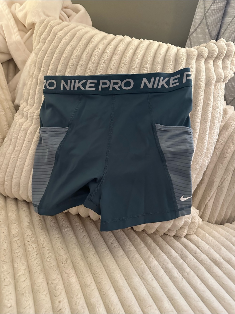 Nike Teal Blue Compression Shorts with Light Blue Striped Pockets